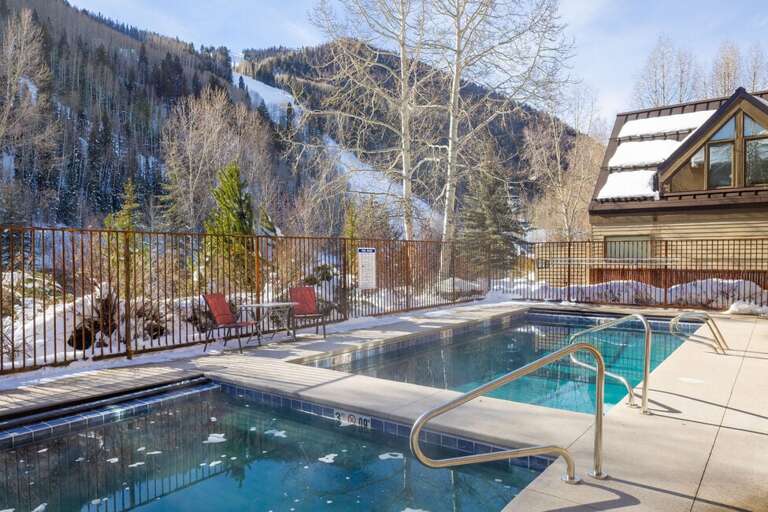 Unwind year-round in the shared outdoor hot tub designed for 10+ guests, with a summer-only outdoor pool that's rarely found in Telluride.