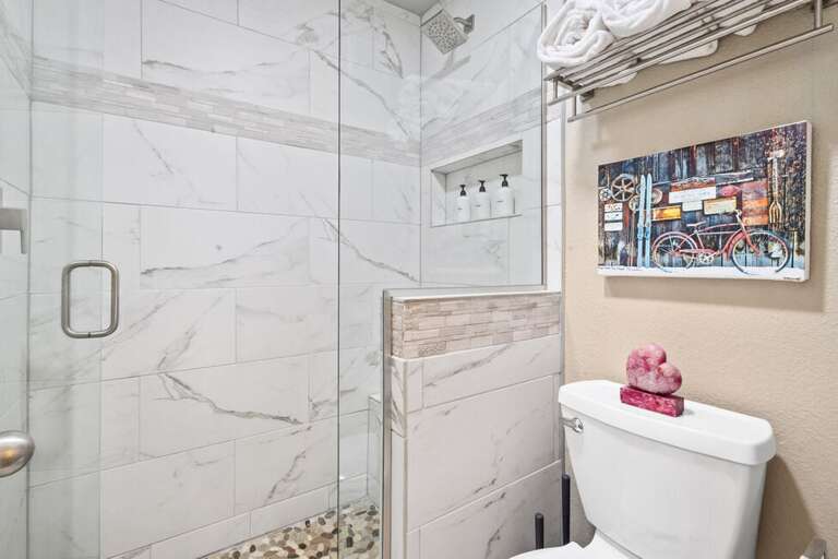 Light, bright and sleek. Enjoy the walk-in shower after a long day on the mountain.