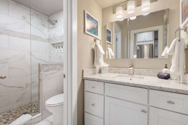 Light, bright and sleek. Enjoy the walk-in shower after a long day on the mountain.
