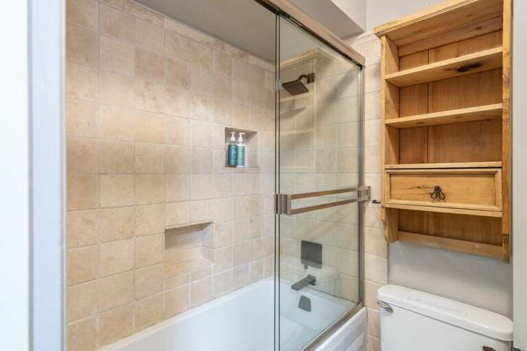 Updated spacious bathroom shower tub combo.