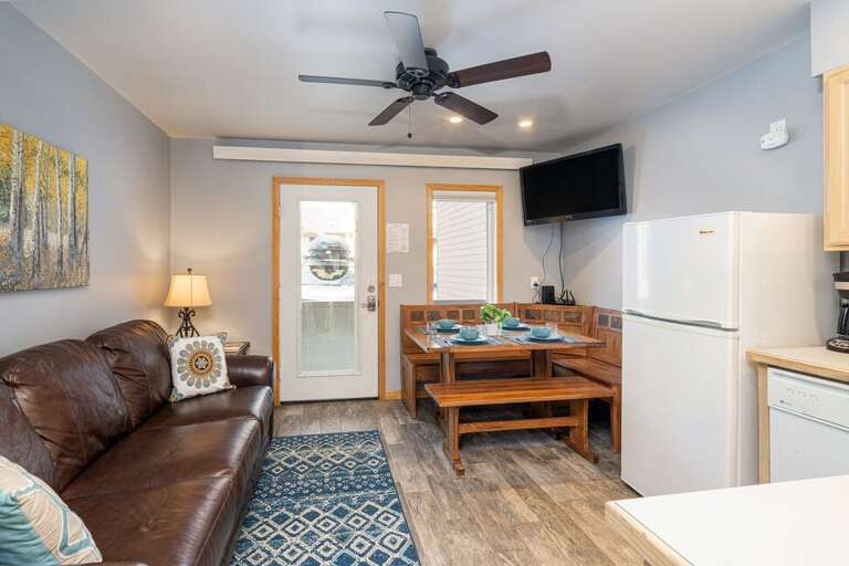 The dining nook comfortable seats 4-5 people. The Sleeper Sofa opens to an additional sleeping space. The dining nook comfortable seats 4-5 people. The Sleeper Sofa opens to an additional sleeping space.