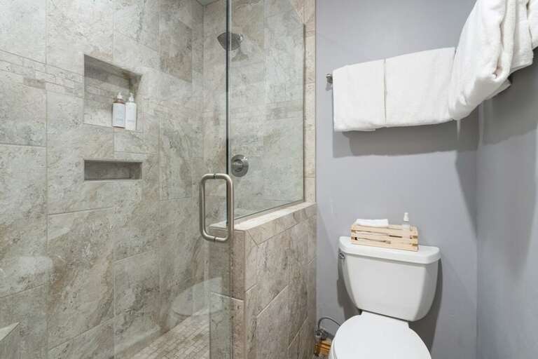 Remodeled modern bathroom with step in shower. Remodeled modern bathroom with step in shower.