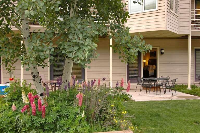 Viking Lodge 119 opens up to a sun filled patio and garden. Viking Lodge 119 opens up to a sun filled patio and garden.