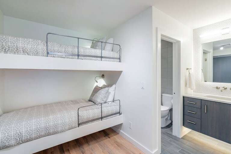 The custom bunk beds are full sized and are perfect for kids or extra friends.