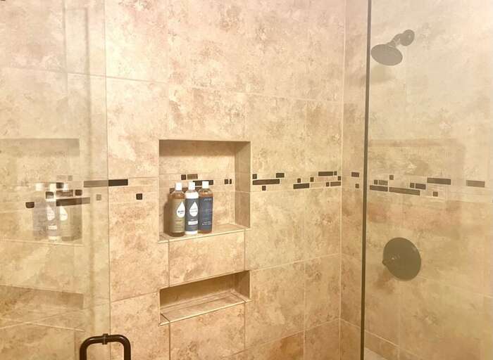 Large, renovated walk-in shower.