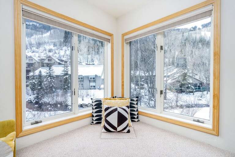 This sun filled bay window overlooks the San Miguel River & the surrounding mountains.