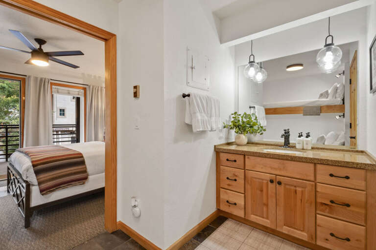 A bright single vanity area with plenty of space, perfect for all guests to get ready comfortably.