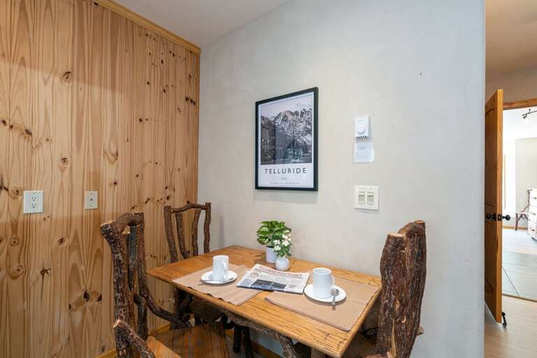 Enjoy coffee in this cozy dining area.