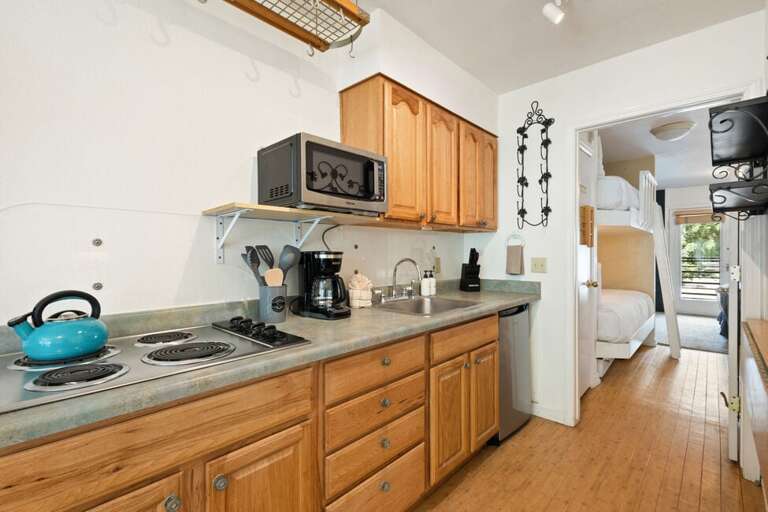 Galley Kitchen with mini fridge