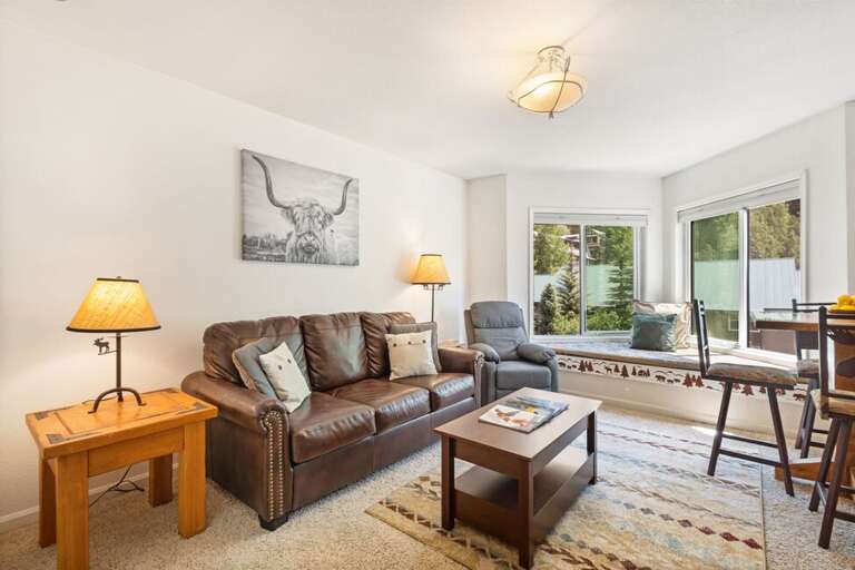 Living area with bay windo.