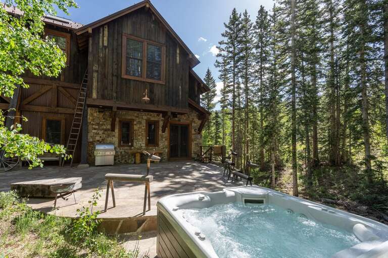 This beautiful home features a private hot tub and a sprawling private patio,