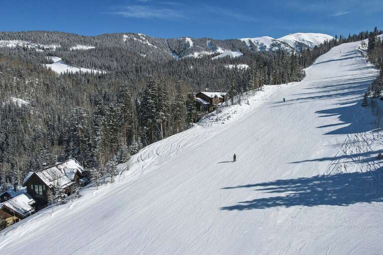 Ski from the back door onto Sundance. Minimal crowds is always a plus.