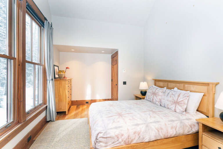 Upstairs guest bedroom with fabulous views.