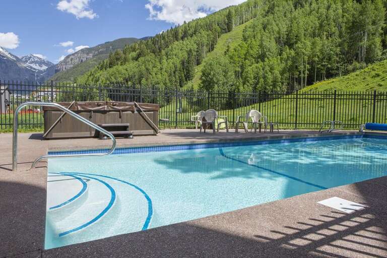 Etta place features a large heated pool (summer only) as well a an 8 person hot tub (all season) for guests visiting.