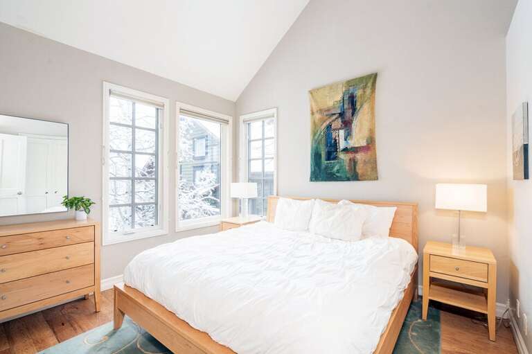 Guest room two also features a Queen bed.  Open with plenty of natural light this room is located on the main level as well.