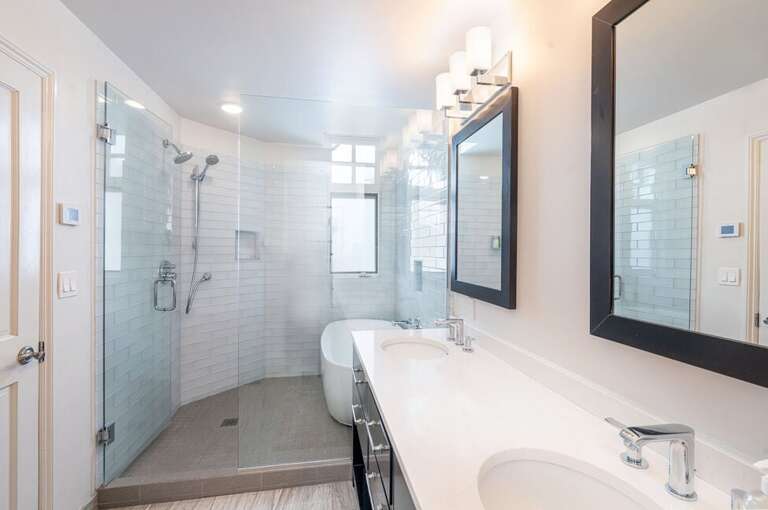 Stunning remodeled bathroom with double vanity.