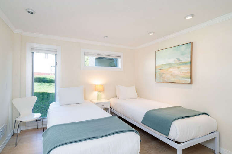 Guest bedroom complete with two Twin Beds (upon request can be converted to a King Bed) and plenty of natural light. Guest bedroom complete with two Twin Beds (upon request can be converted to a King Bed) and plenty of natural light.