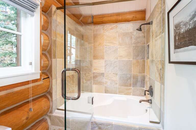 Large walk-in shower/tub combo.