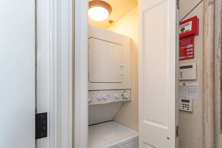 In-unit washer and dryer for guests to use during their stay on the bottom level.