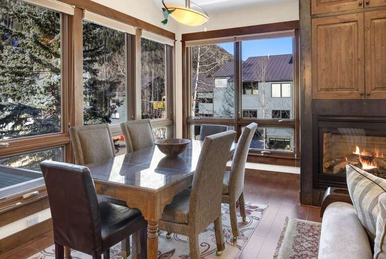 The dining area seats 6- perfect for entertaining friends with great views of the mountains.