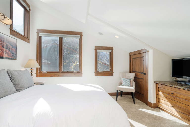The Primary Queen Bedroom is located on the Third Level of this unit.  Great natural light with plenty of storage for clothing. The Primary Queen Bedroom is located on the Third Level of this unit.  Great natural light with plenty of storage for clothing.