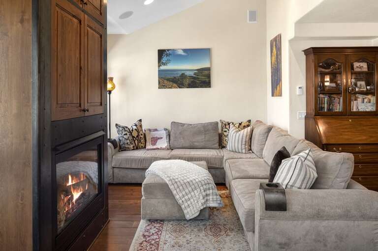 This unit features three landings.  The second level is accessed via set of stairs and features a large open concept living, kitchen and dining area.