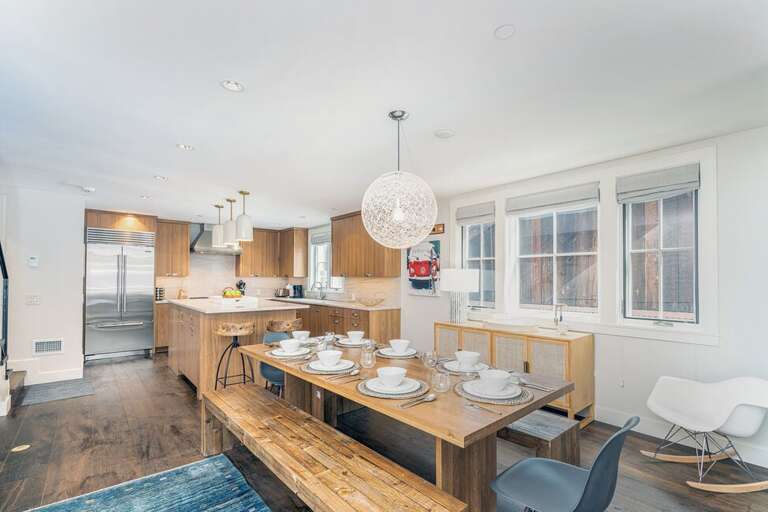 Enjoy a home or chef-cooked meal at the extra long dining table. Enjoy a home or chef-cooked meal at the extra long dining table.