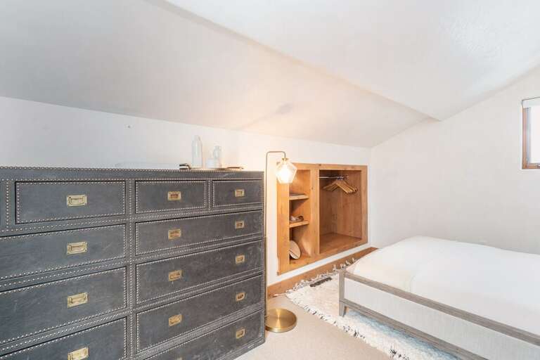 The fifth level features Guest Room 2 with a Queen bed.