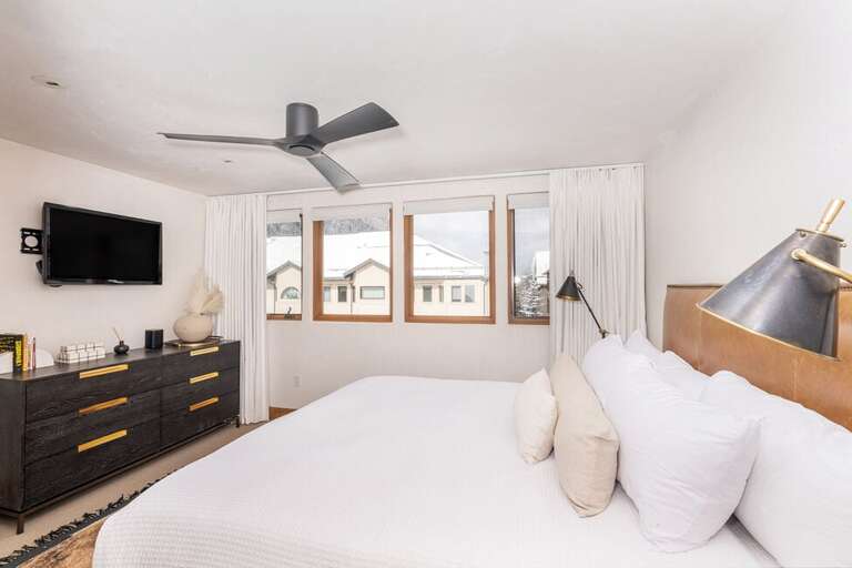 This primary bedroom has great views as well as ample space. This primary bedroom has great views as well as ample space.
