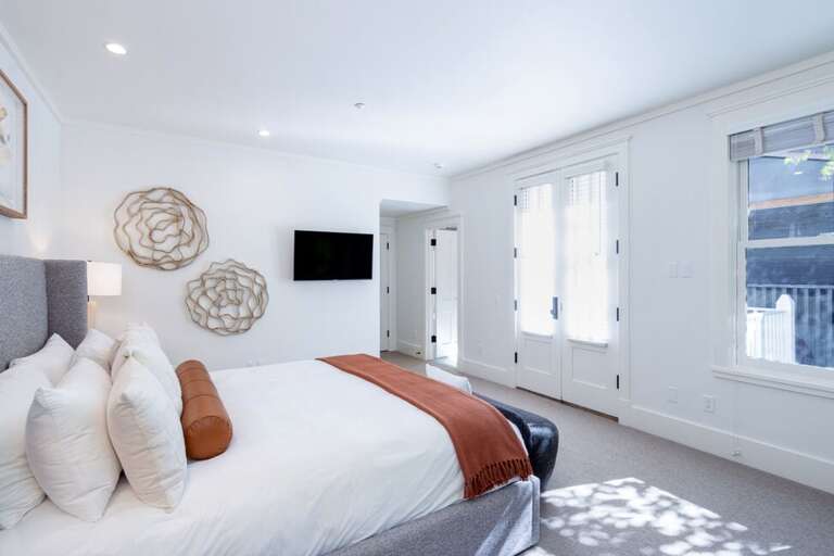 Beautiful open and spacious California King primary suite with ensuite bathroom and private deck