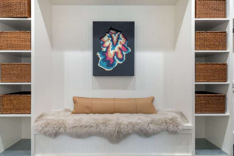 A functional and stylish mudroom provides plenty of space for all you gear, shoes, jackets.