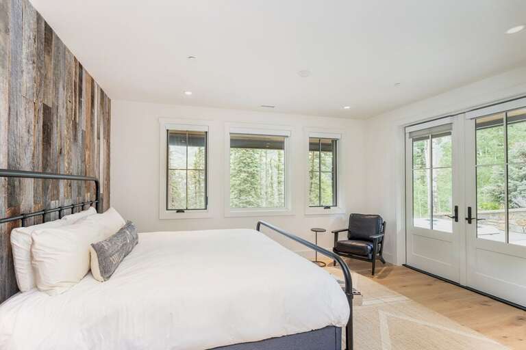 The Bottom Level Guest Room features a King bed as well as easy access to the hot tub located just steps away from your room.