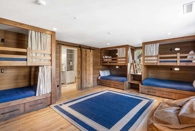 The Bunk Room, located one level below the main floor, is perfect for kids or additional guests and