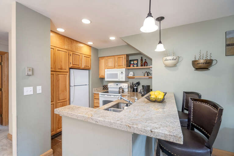 Breakfast bar seating for two and a great place to catch up on the days activities.