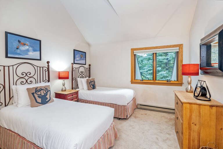 The Guest bedroom has two twin beds that can be converted into a king upon request.