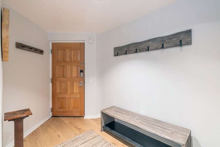 Great front mud room with plenty of room for all your gear.