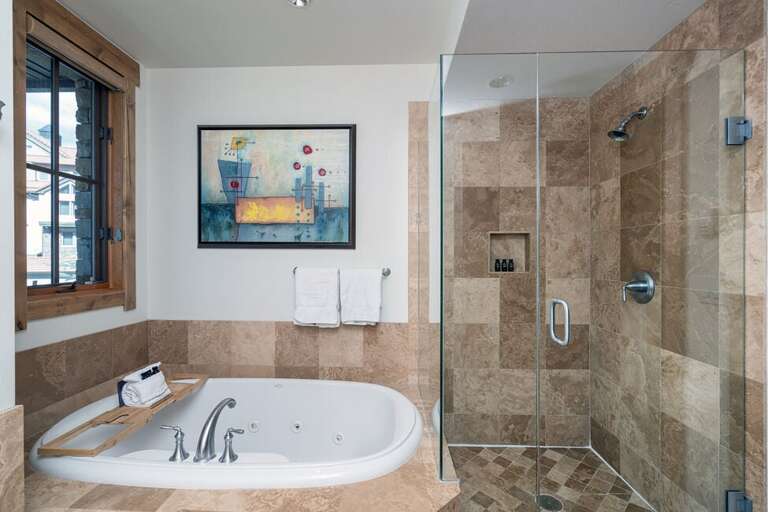 Guest Room 2 ensuite hosts a Jetted tub and walk-in shower.