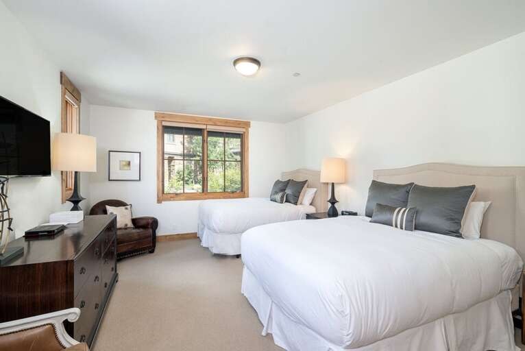 Guest room 2 features two Queen beds and en suite bathroom.
