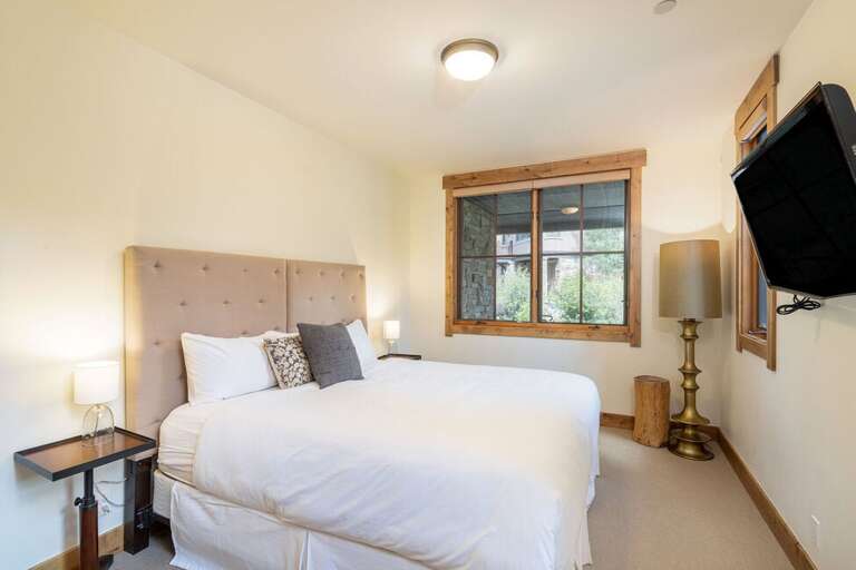 Guest room One, located on the entry level, features a King Bed (can be changed to two twins upon request) and ensuite bathroom.