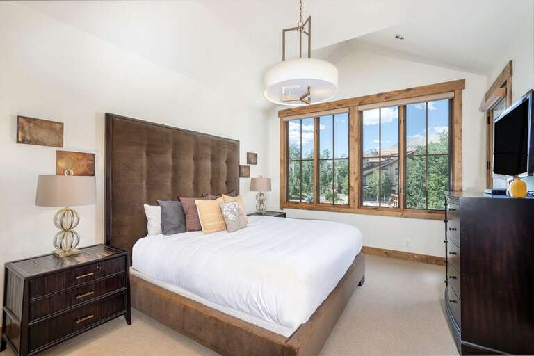 The Primary Bedroom is located on the second level and features an ensuite bathroom, private deck and King bed.