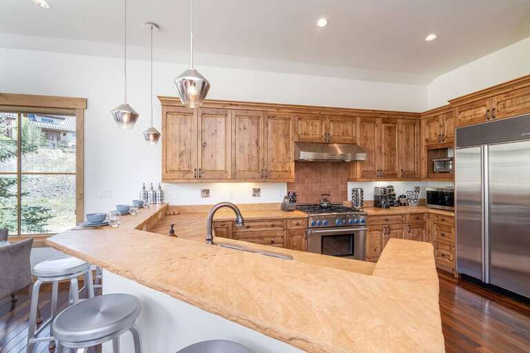 Stainless steel appliances, 6 burner gas stove fit for a chef and plenty of counter space, this ideal Chefs Kitchen is perfect for all your needs.