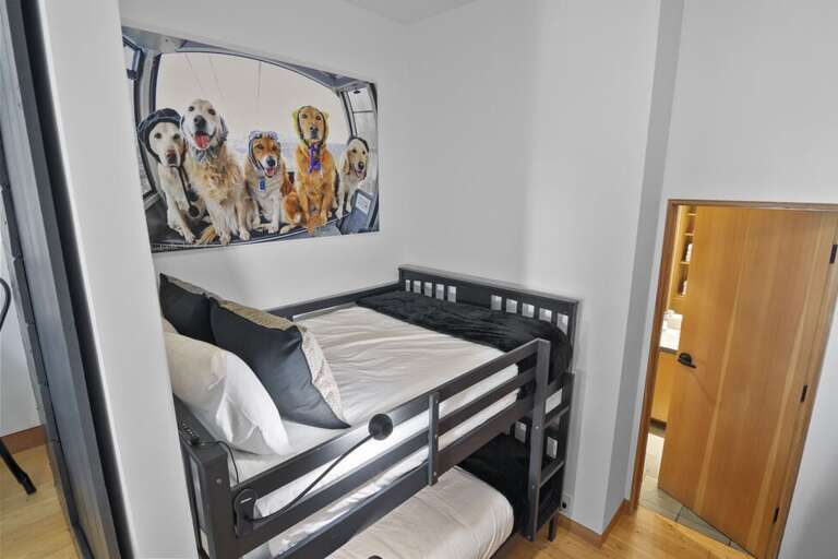 Cozy Bunk beds with personal lighting.