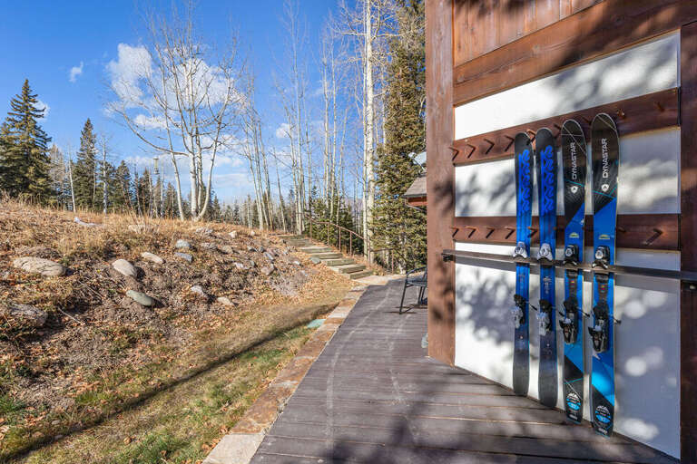 From the foyer you exit on to the wrapped around back deck allowing you access to the hot tub as well as  Blue Run Sundance off Lift 10.
