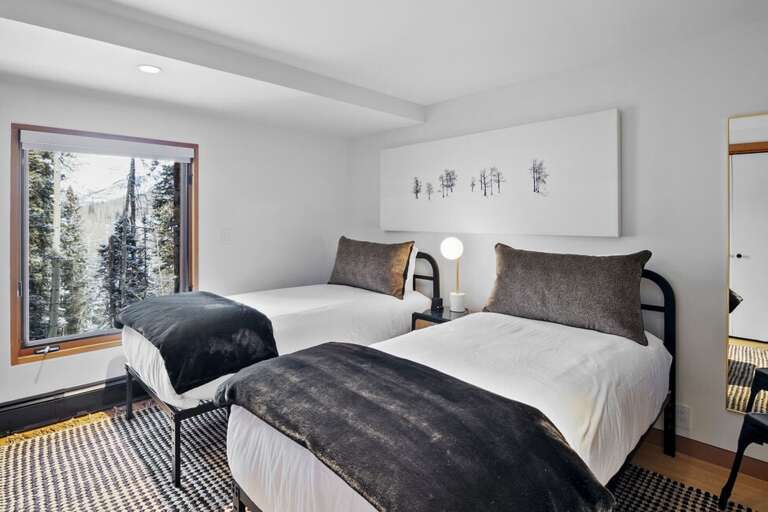 Guest Room three features Two twins that upon request can be converted to a King Bed.