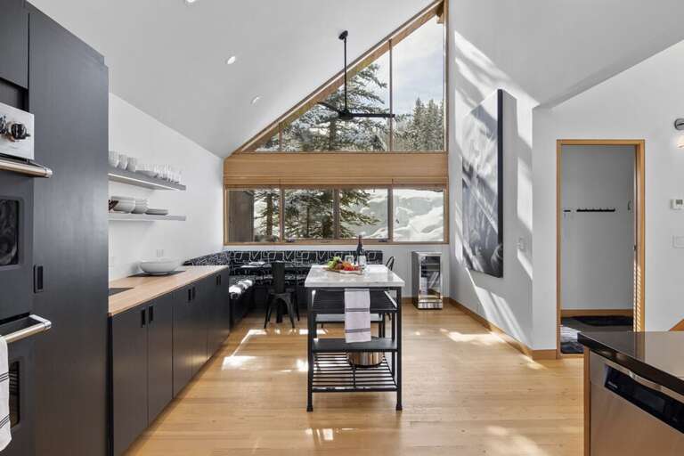 This kitchen level features banquet seating for 6-8 people.