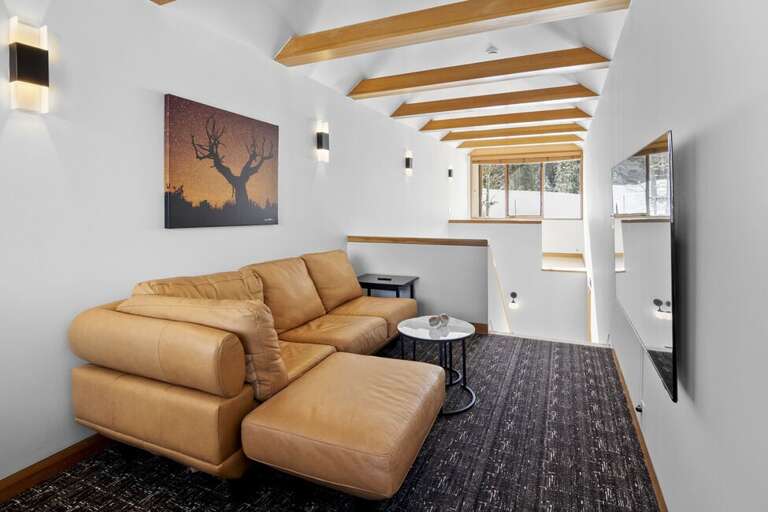 The loft/office is on the highest floor and offers a quiet place to enjoy a movie or catch up on some work.