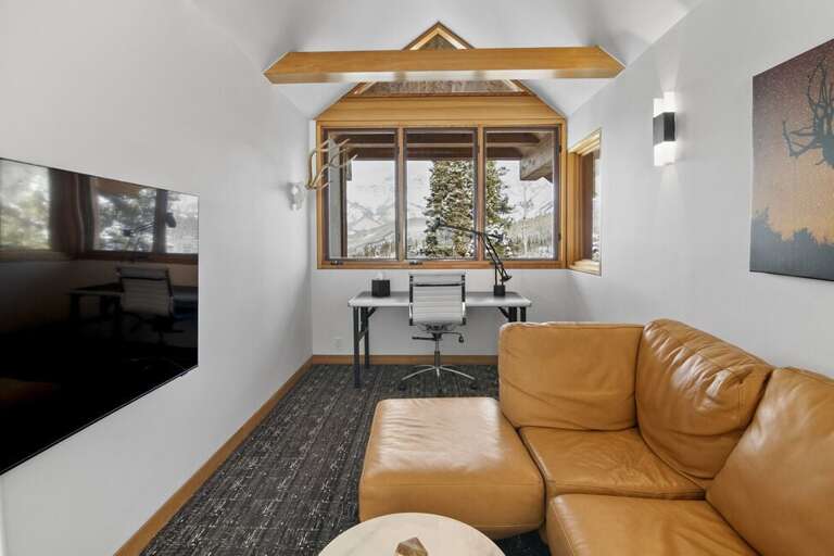 The loft office has incredible views for you to enjoy as you sipping your morning coffee or check emails.