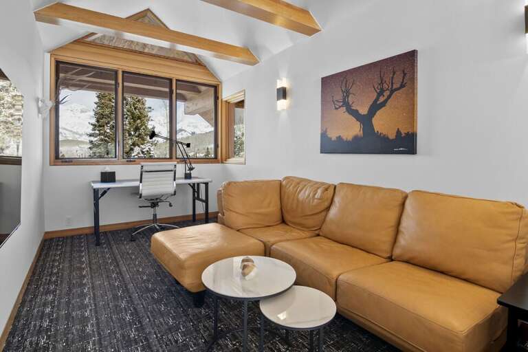 The loft office has incredible views for you to enjoy as you sipping your morning coffee or check emails.