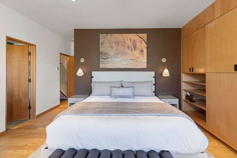 Primary bedroom with a king bed and en suite bathroom.