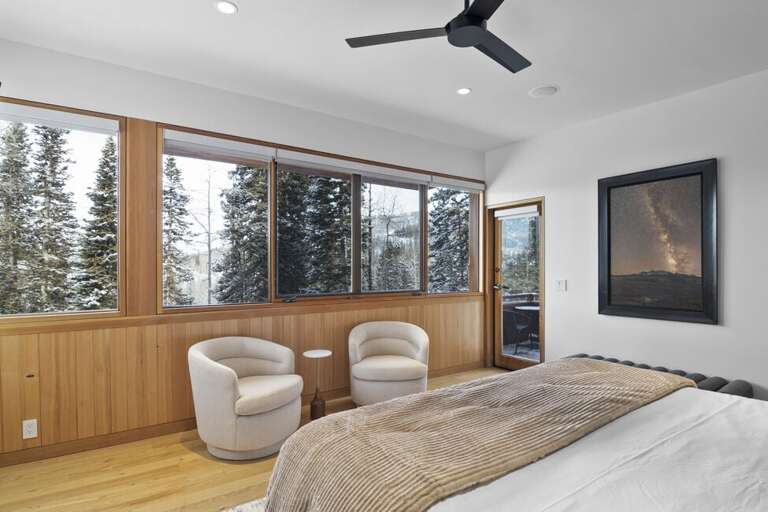 The primary bedroom offers stunning views from bed.